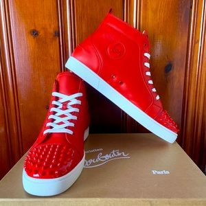 red sneakers with spikes